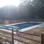 wooden barior around the pool close shot